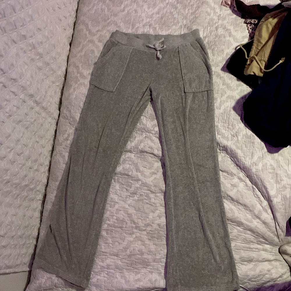 Y2K low rise flared grey and teal leggings.